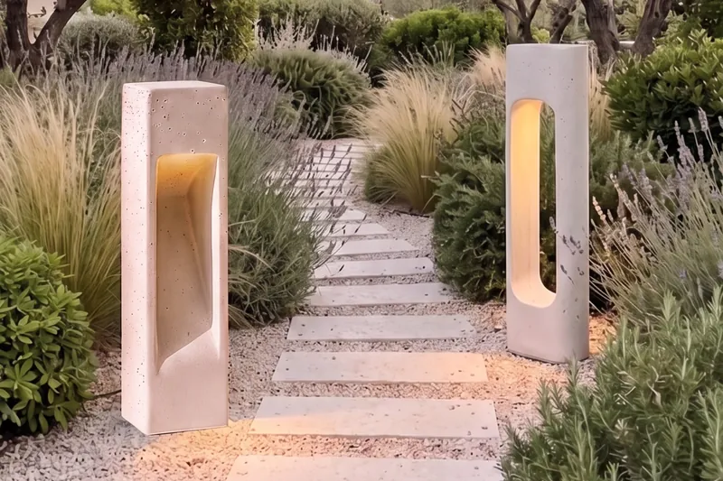 NICHE and PORTAL glowing on a garden path between olive trees
