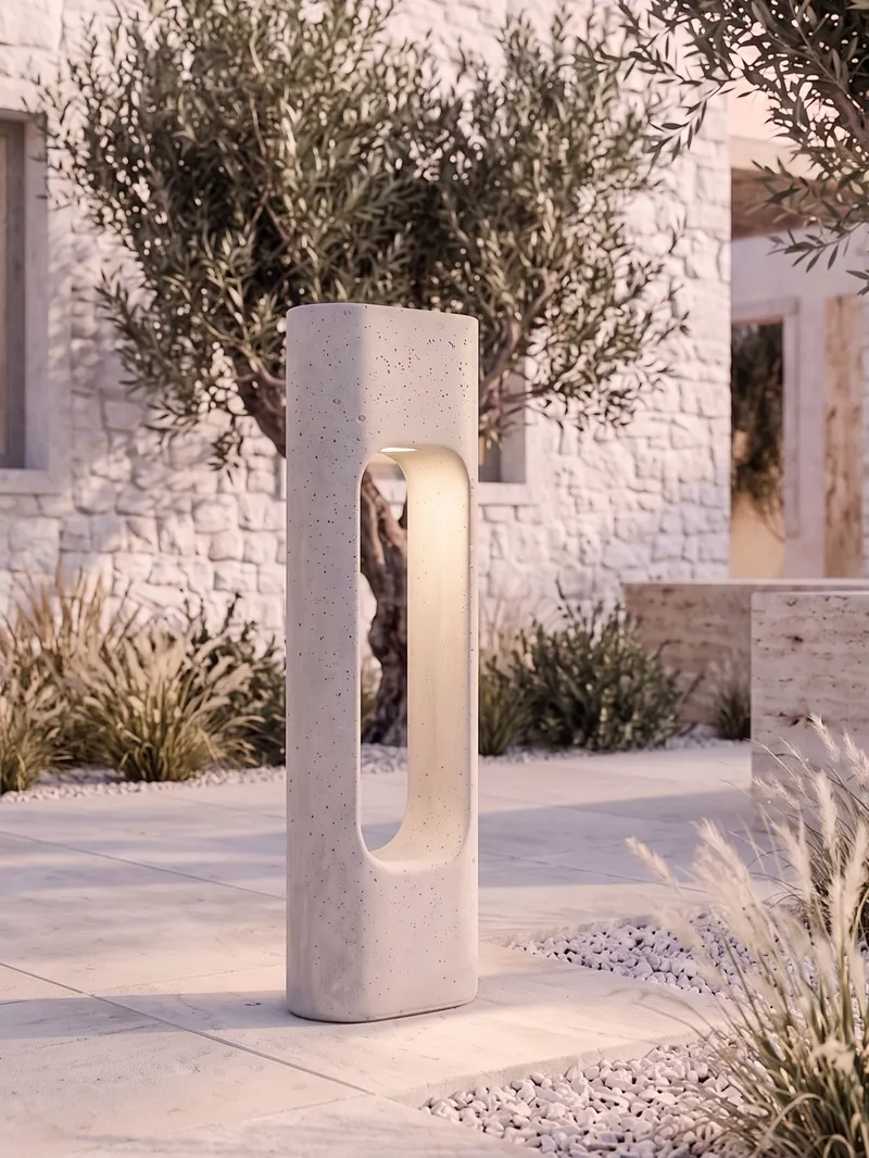 PORTAL concrete garden light glowing at dusk