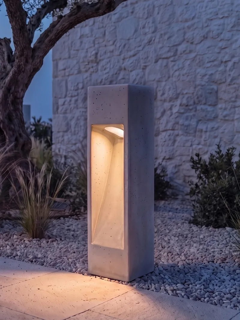 NICHE concrete light glowing warmly at night